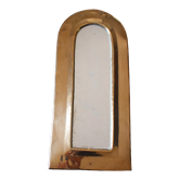 Rounded brass mirror