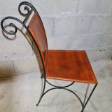 4 leather and wrought iron chairs