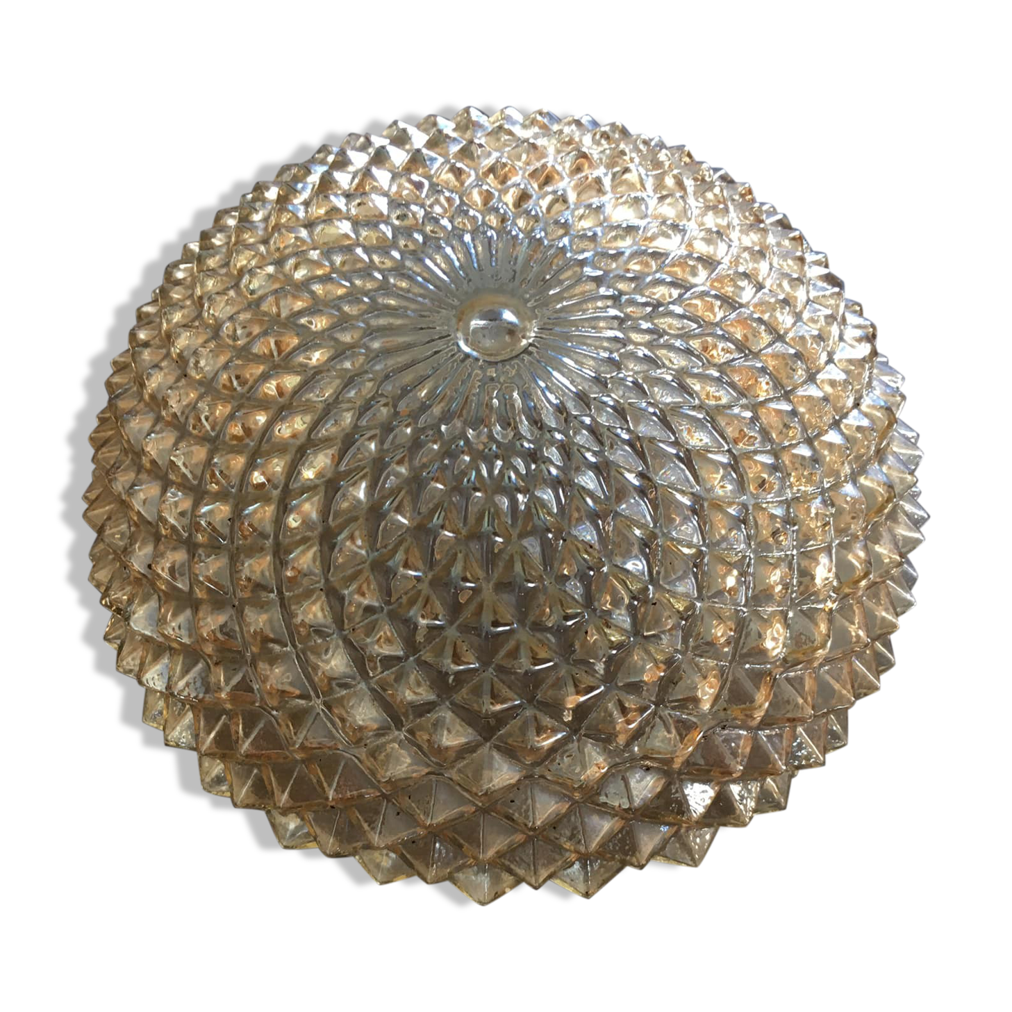 Slightly amber worked glass globe