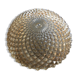 Slightly amber worked glass globe
