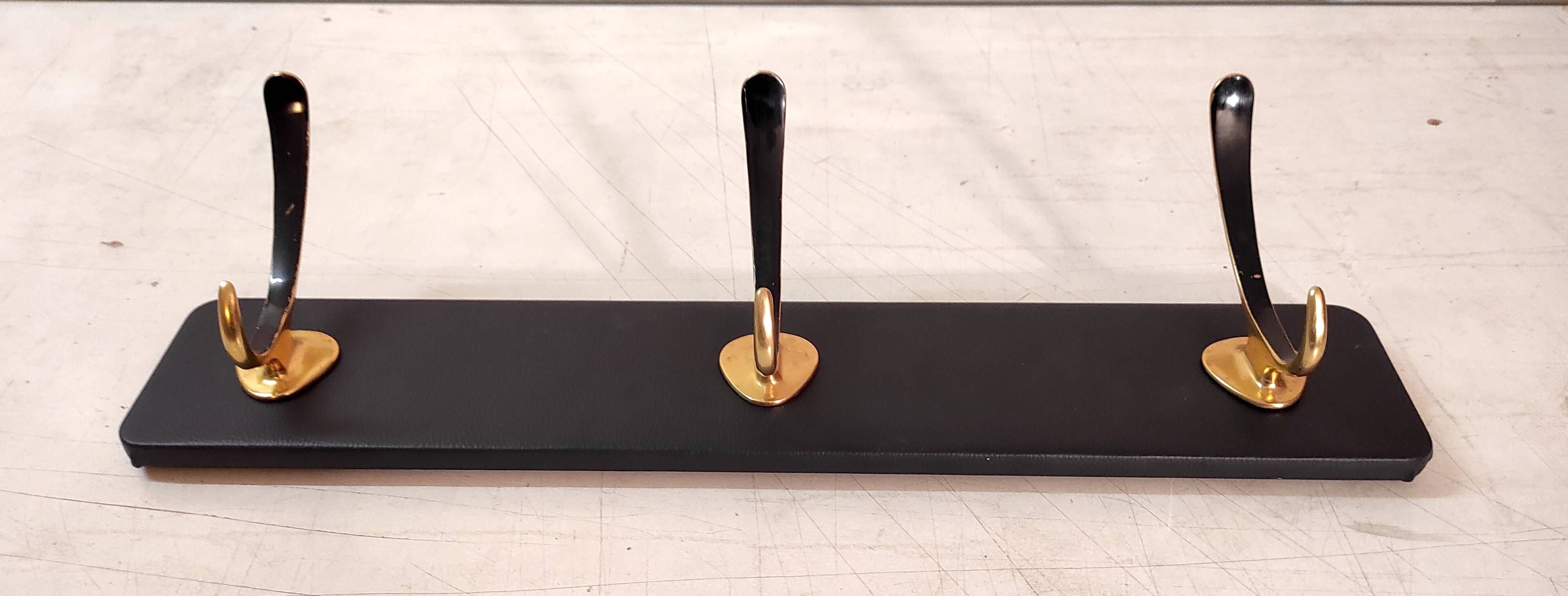 Wall-mounted coat rack in brass, 1950s-60s