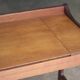 Succession LACOSTE: Scandinavian teak desk hairdresser (1960s).