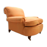 Deep seated armchair in the style of Howard & Sons