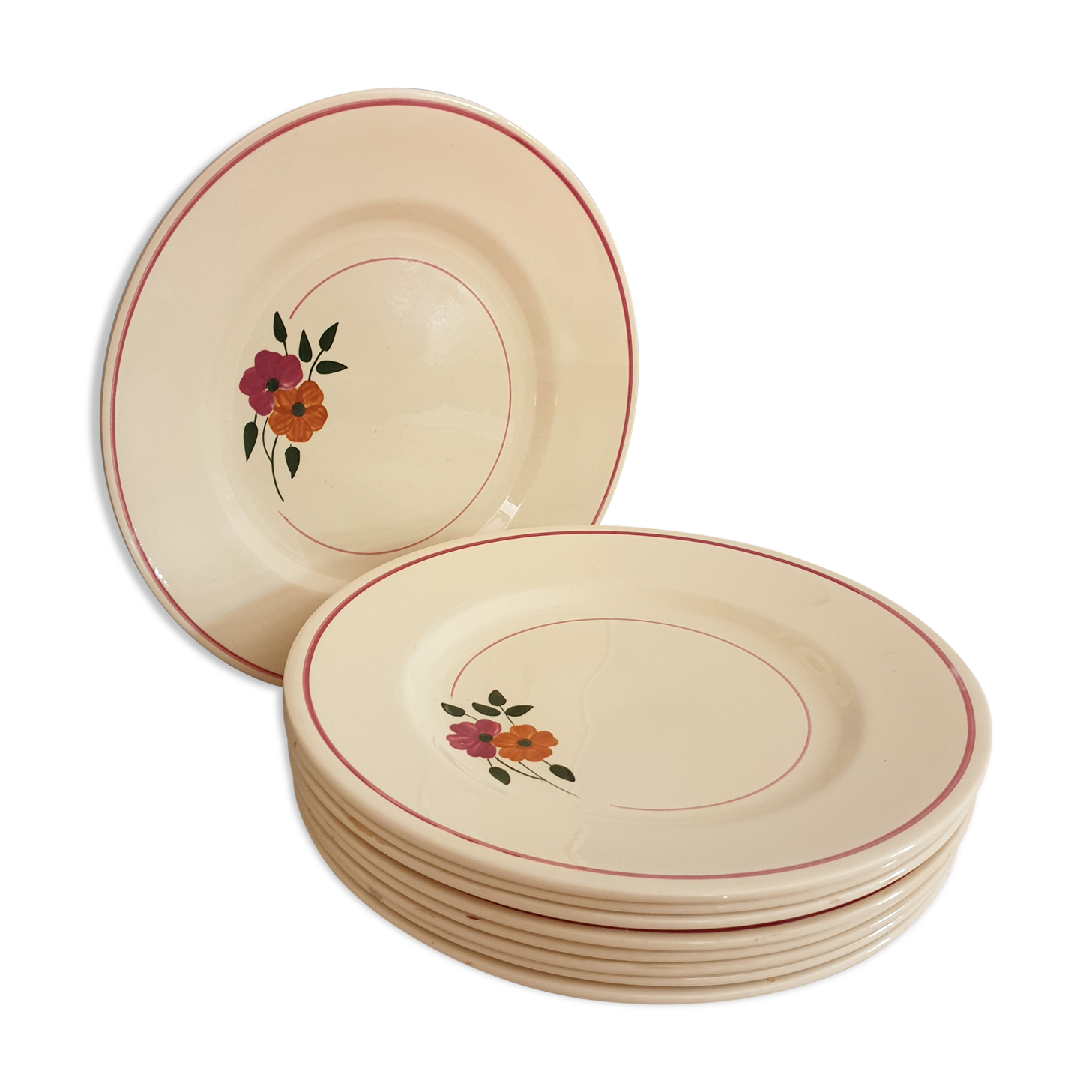 Set of 11 hand-painted earthenware plates