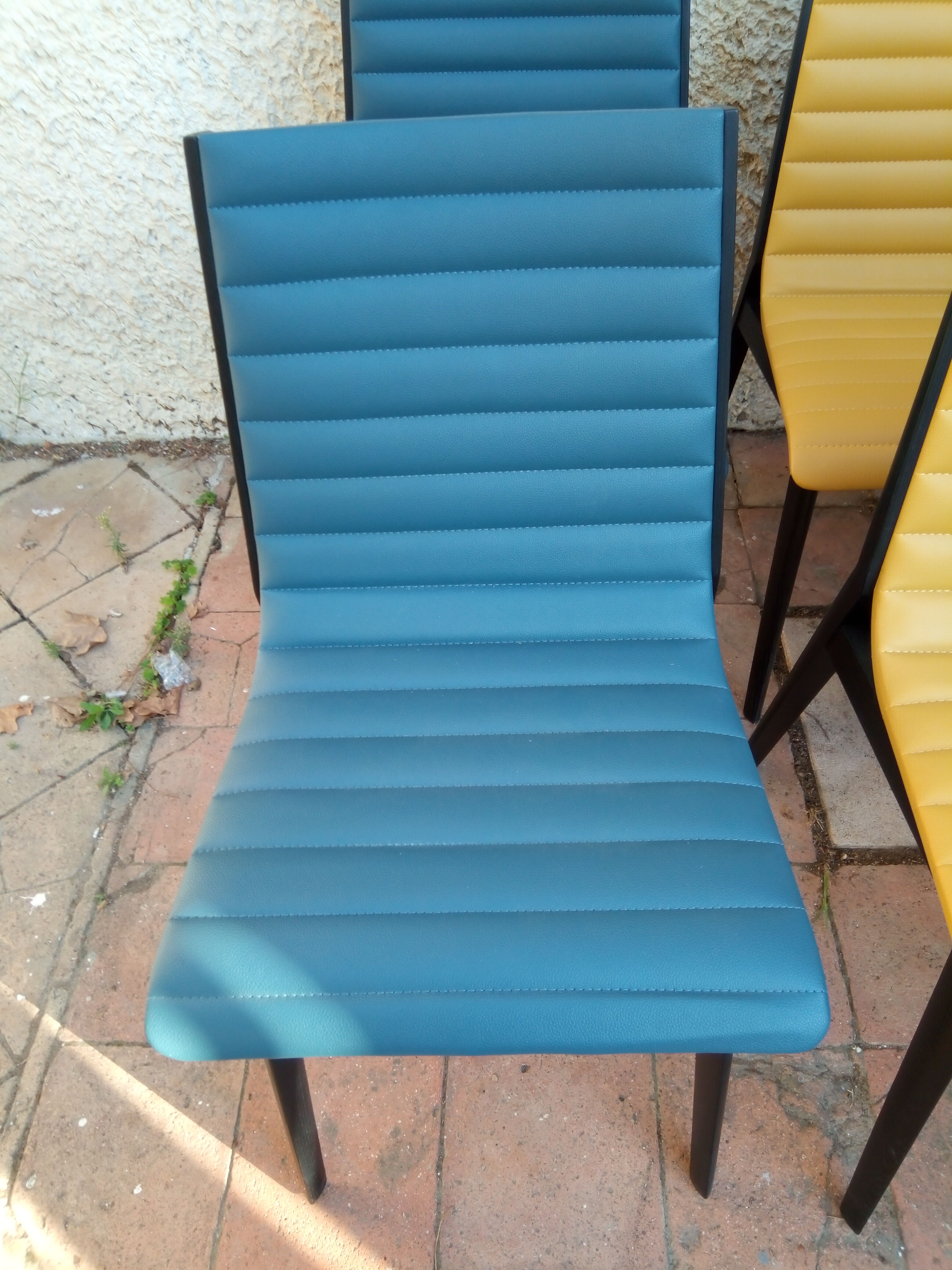 Suite of 6 modernist chairs from the 80s