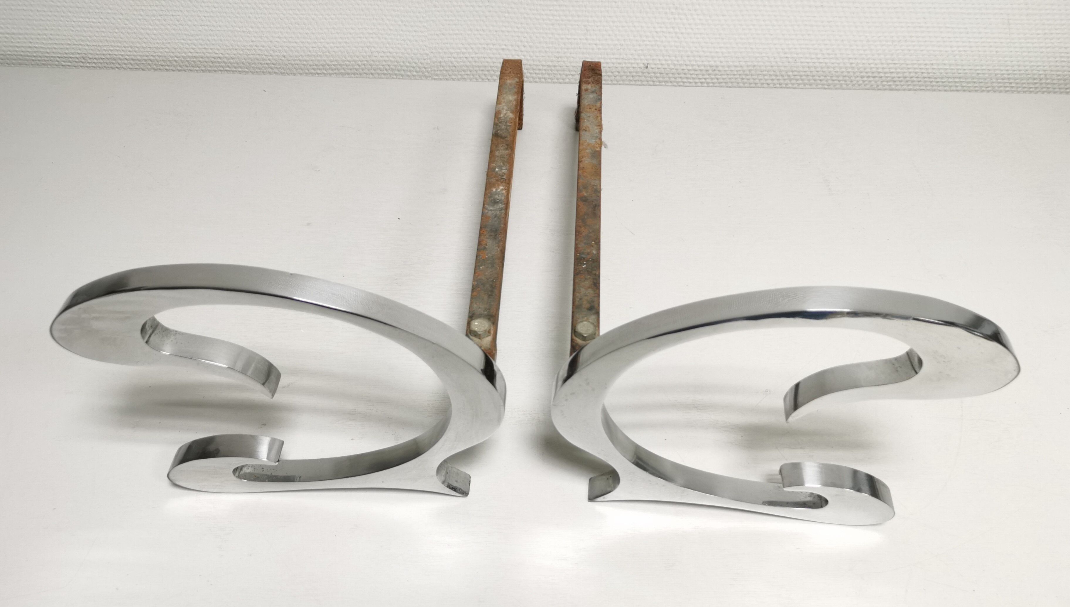 Pair of andirons in brushed steel and metal edition Jean-Paul Créations circa 1970