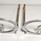 Pair of andirons in brushed steel and metal edition Jean-Paul Créations circa 1970