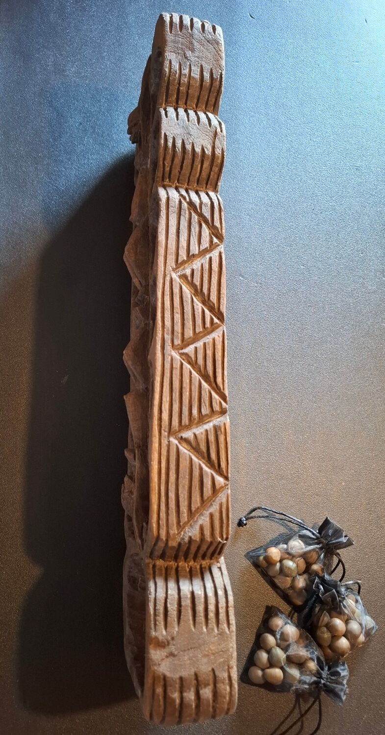 Genuine traditional Awalé made of carved solid wood.