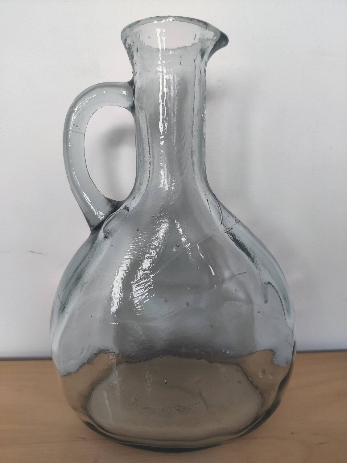 Antique carafe made of thick glass