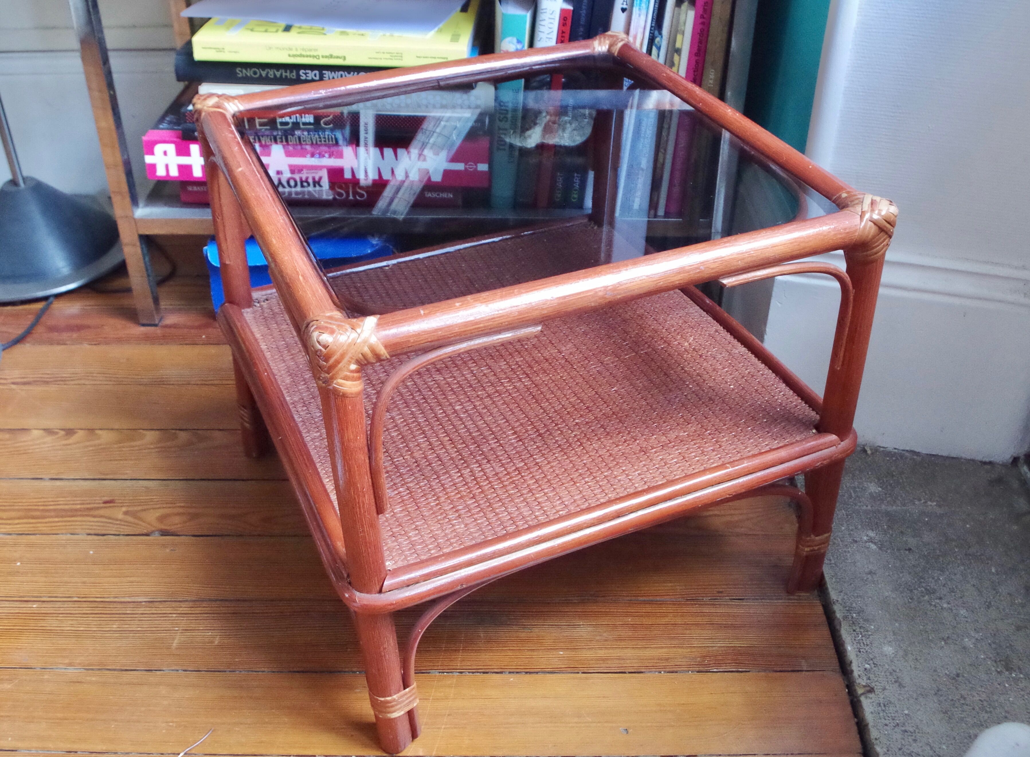 Varnished rattan coffee table and smoked glass top