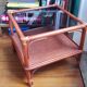 Varnished rattan coffee table and smoked glass top