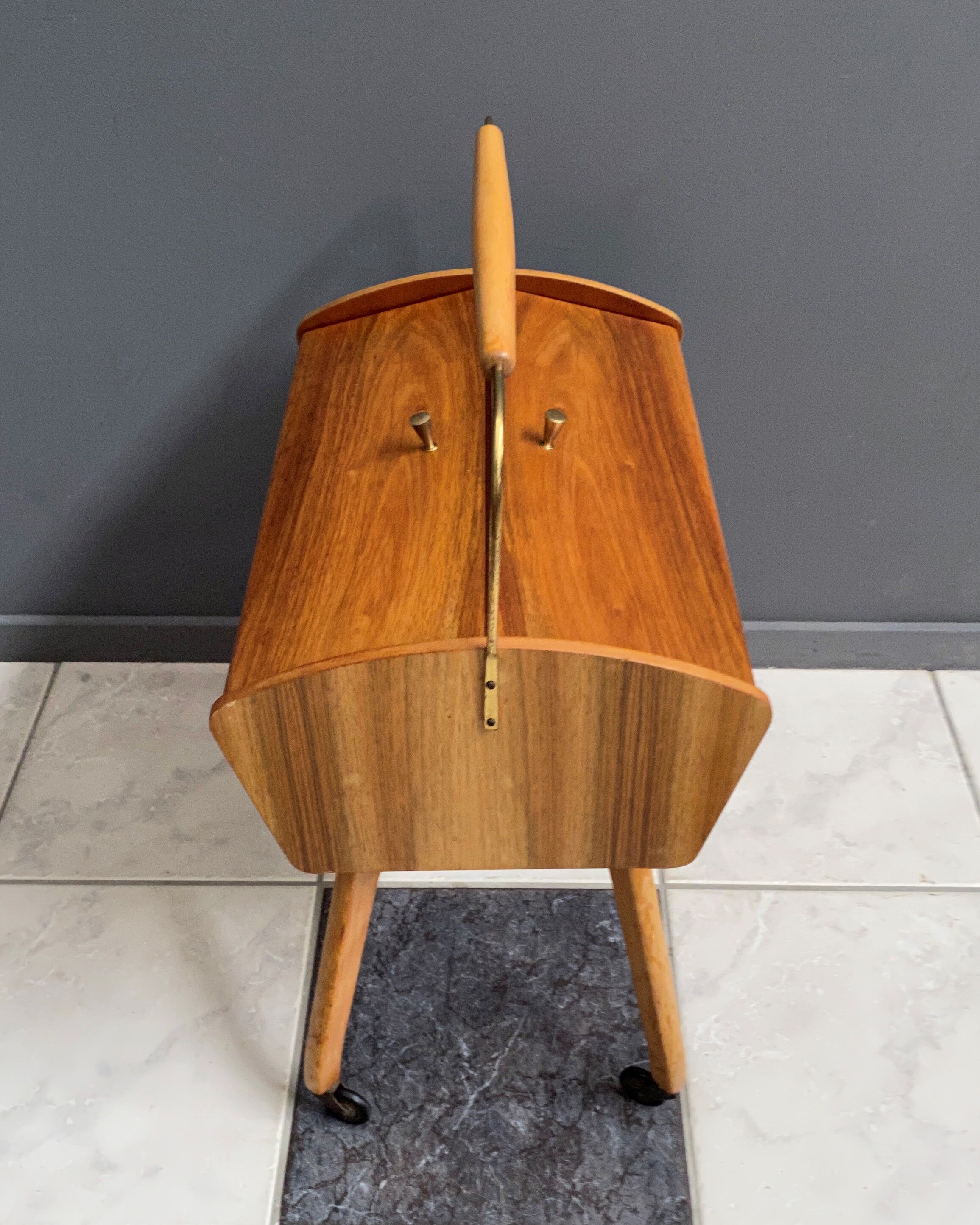 Sewing box on legs and wheels