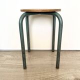 Wooden stool with metal tubes