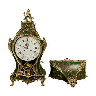 Neuchâtel Louis XV cartel with its lacquered wooden console around 1900