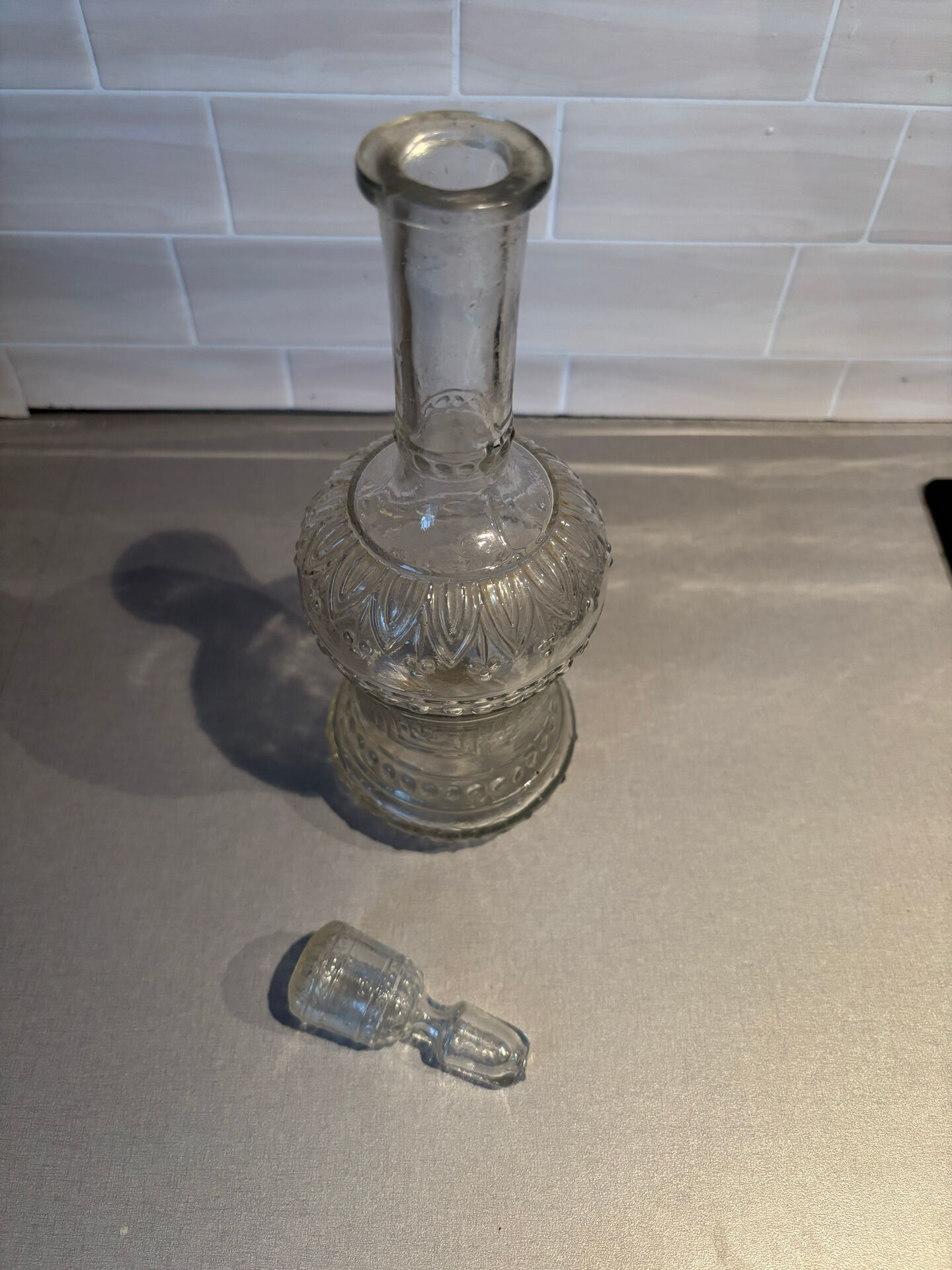 Antique glass bottle with stopper – vintage glassware