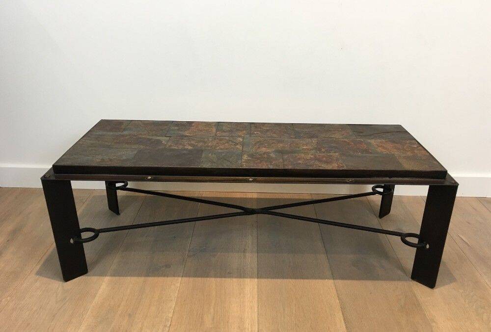 Rare coffee table in steel and wrought iron with a top made of lava stones