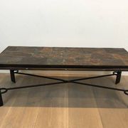 Rare coffee table in steel and wrought iron with a top made of lava stones