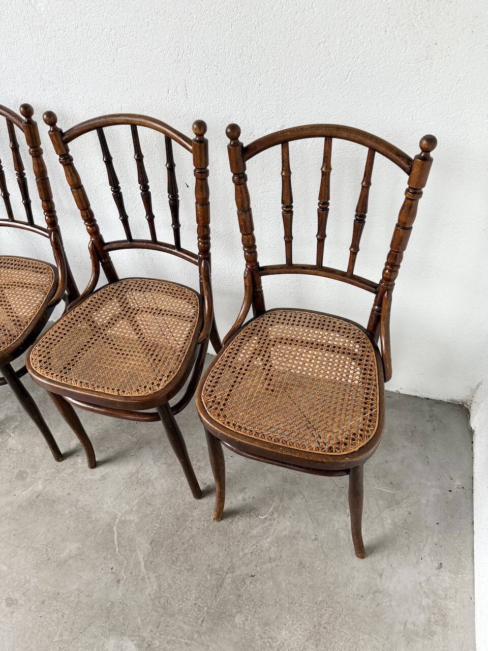 Set of 4 Fischel cane bistro chairs
