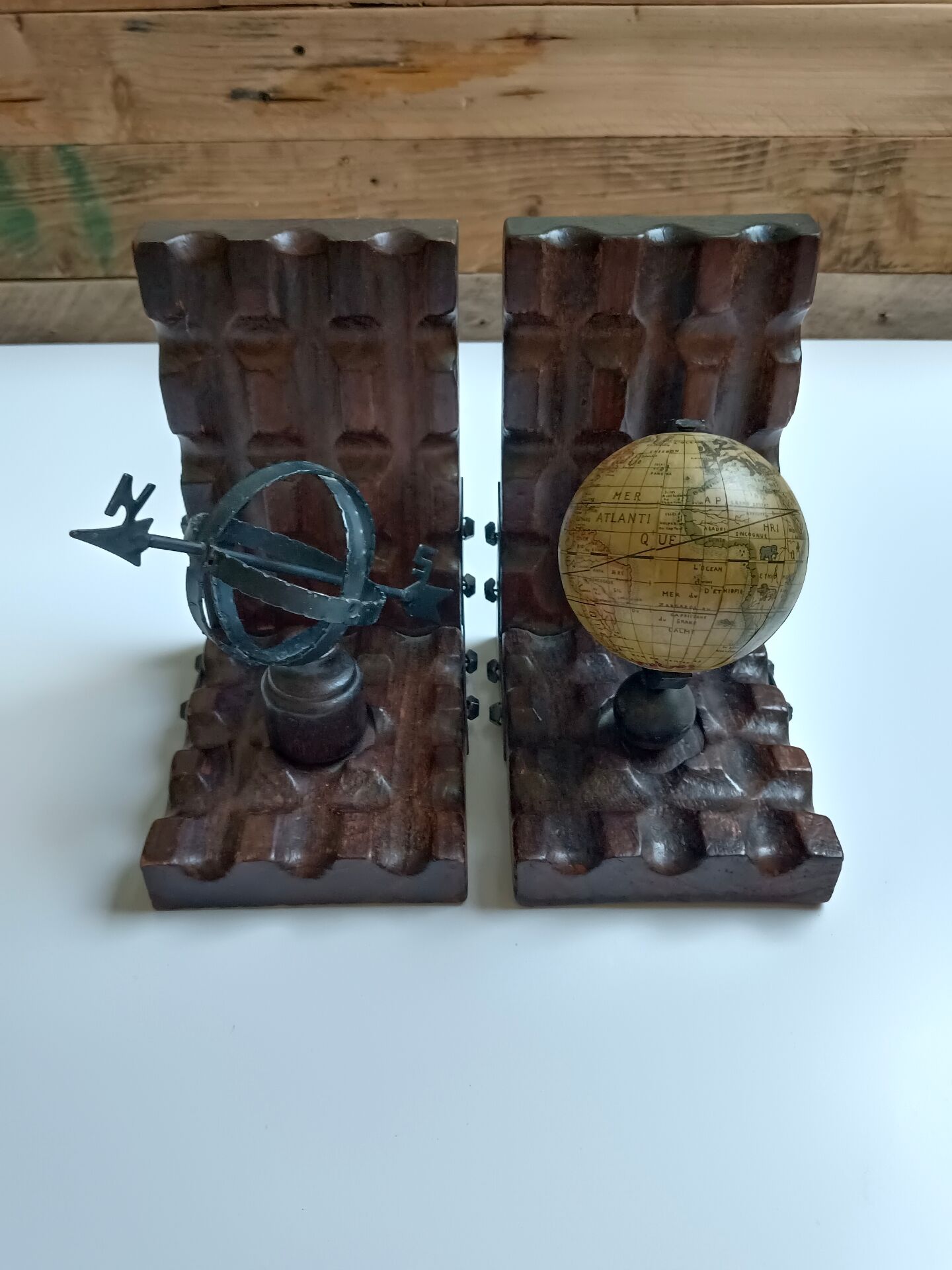 Wooden bookends globe world map
