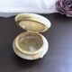 Small round box in green marbled onyx tripod lion paws brass