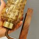 wall lights in rosewood look, with amber coloured glass and brass details.