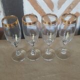 Set of 4 champagne flutes gold border