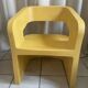Orange-yellow designer armchair