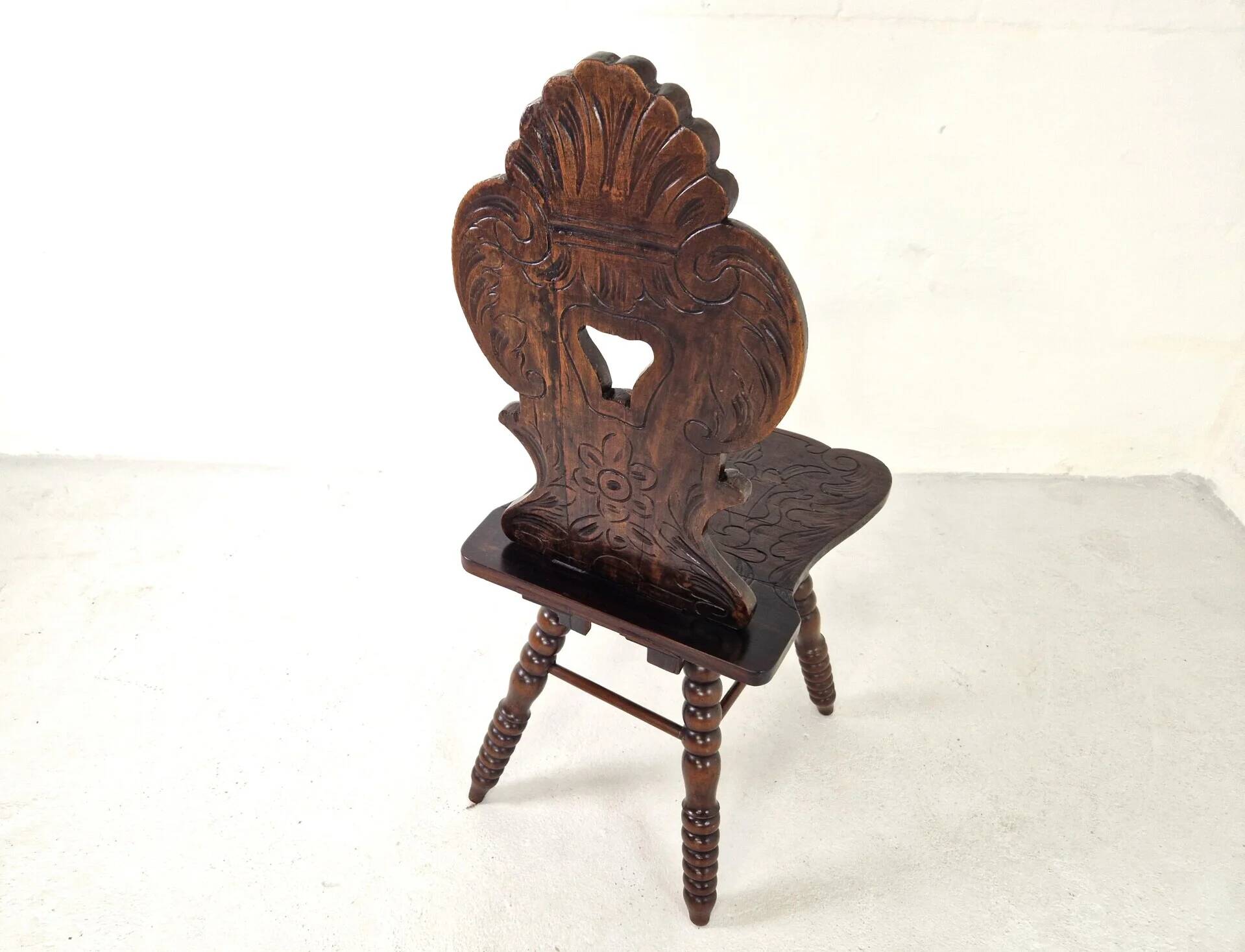 Antique Gothic hall chair with bobbin legs