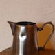 Coffee set in silver metal composed of 3 pitchers, Millan Freres, Paris
