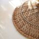 Table basse diabolo en rotin et plateau en verre