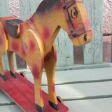 Old toy horse on wheels
