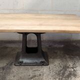 Industrial table with oak top and cast iron central leg