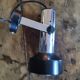 Adjustable wall spotlight in chrome metal and black aluminum