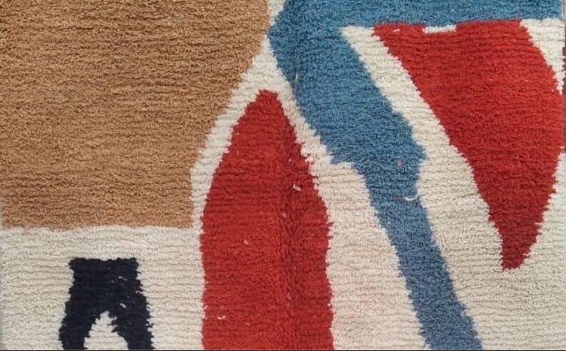 Magnificent handmade Berber rug, adorned with colourful geometric patterns.