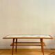 Mosaic coffee table, teak and straw, created by designer Paul Jensen.