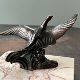 Pair of marble bookends with bronze birds