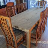 Set of 8 teak lounge chairs with high backs and zebra-striped seats