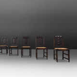Set of six oak an wicker dining chairs by Victor Courtray