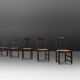 Set of six oak an wicker dining chairs by Victor Courtray