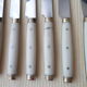 Set of 6 cheese knives and 1 Vintage Bakelite serving knives
