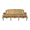 Carved beech and lacquered beige sofa in Louis XV style