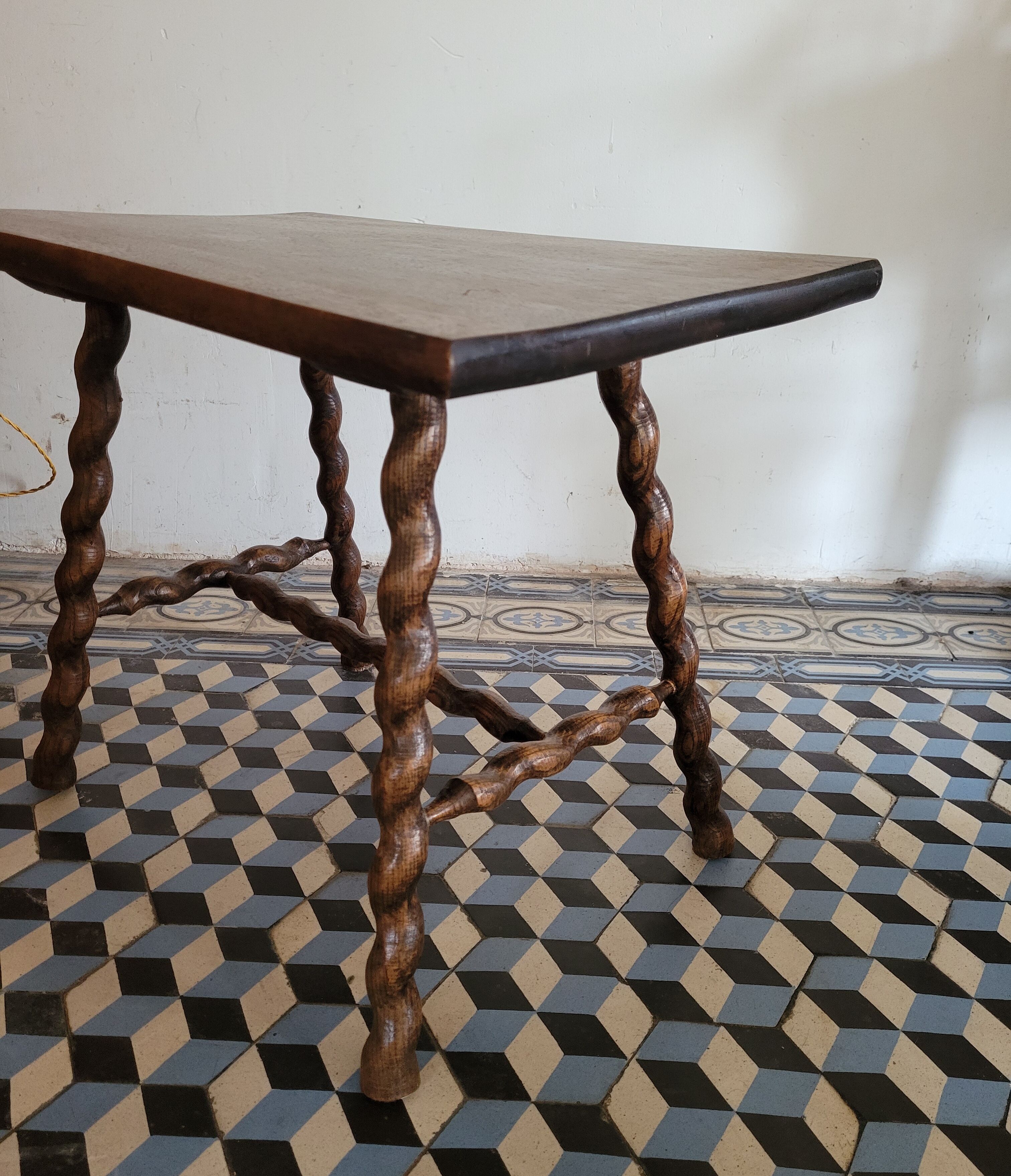 Brutalist coffee table with turned wooden legs