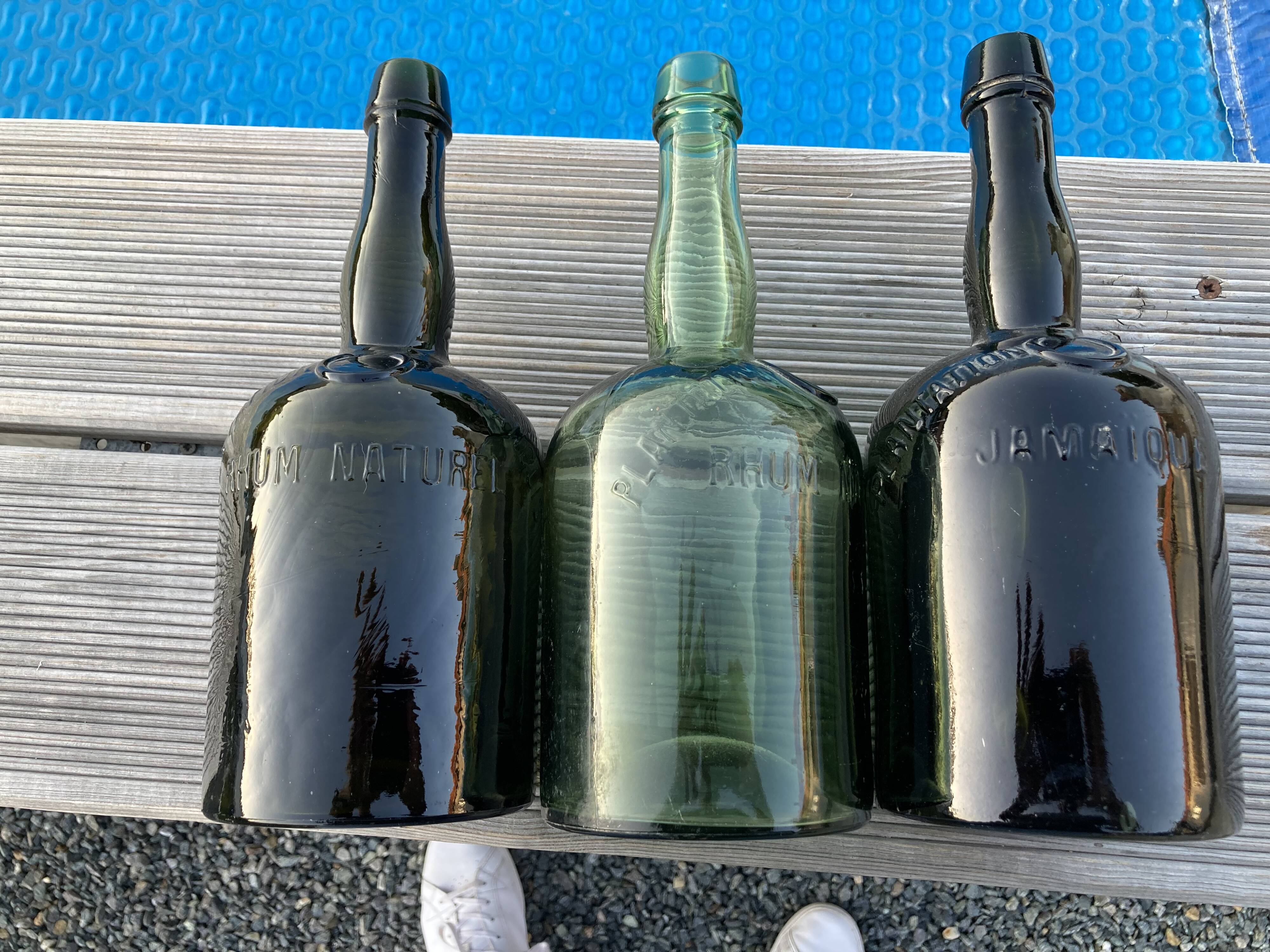 Set of three Vintage Rum Bottles