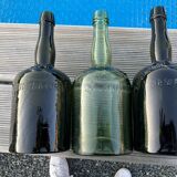 Set of three Vintage Rum Bottles