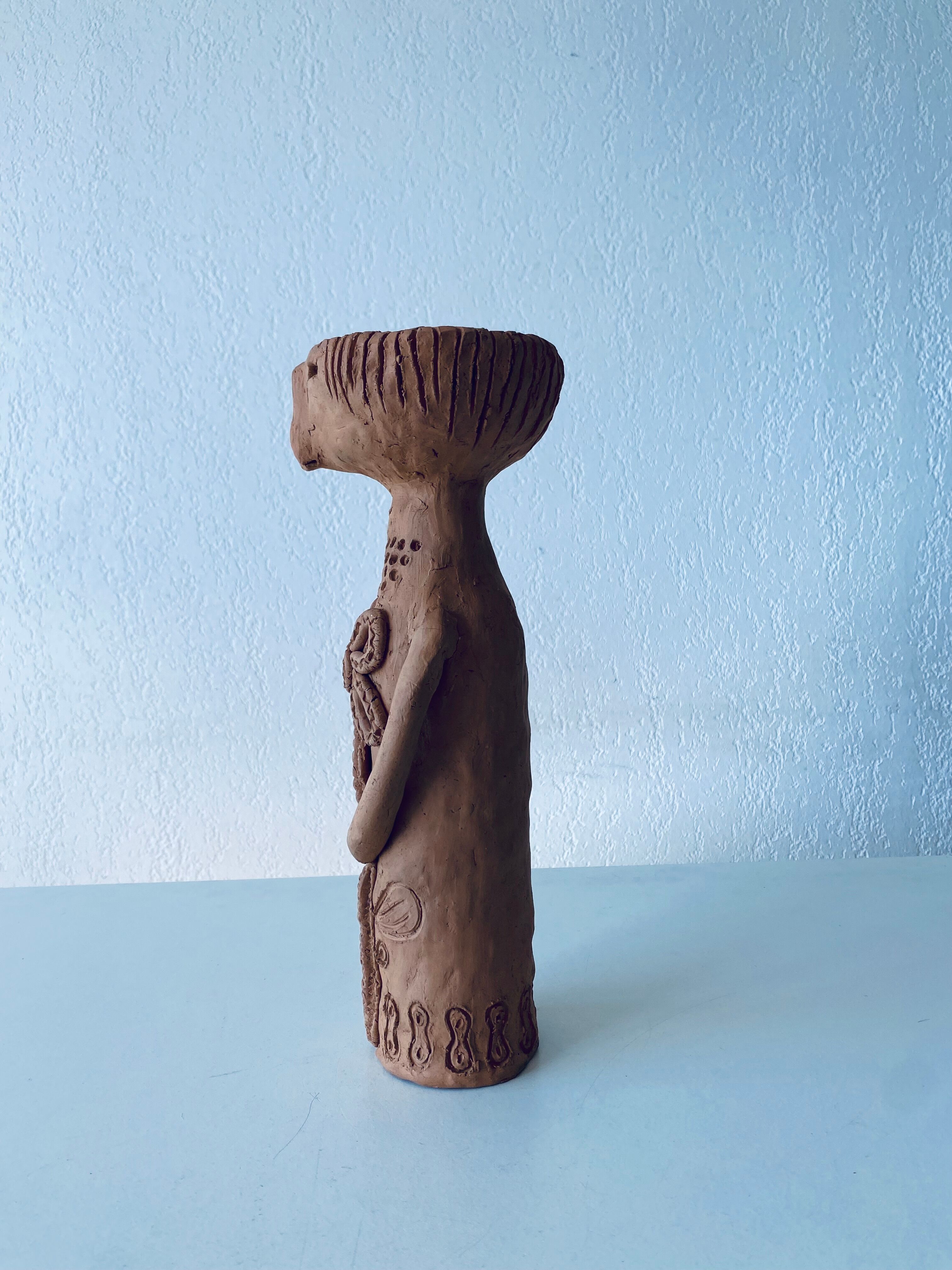 Terracotta personified vase