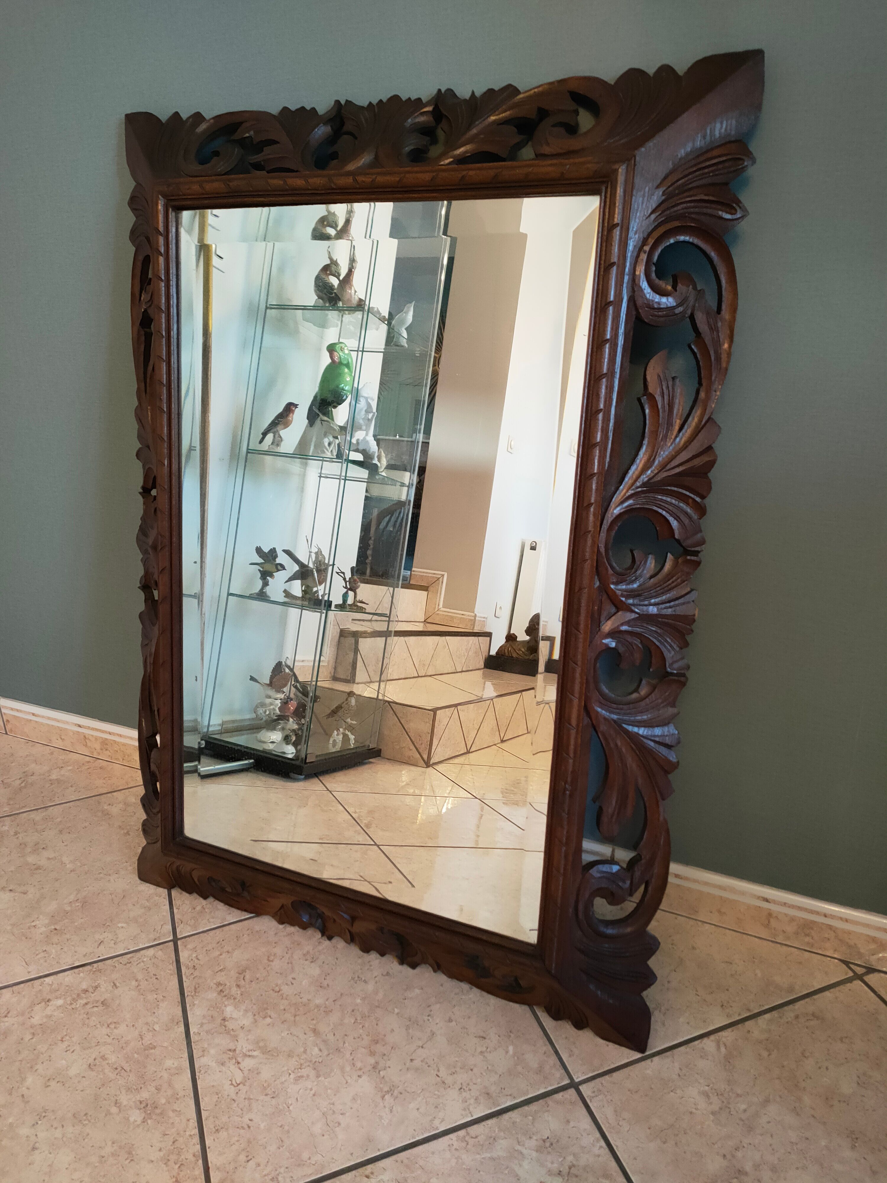 Antique mirror in openwork carved wood