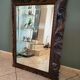 Antique mirror in openwork carved wood