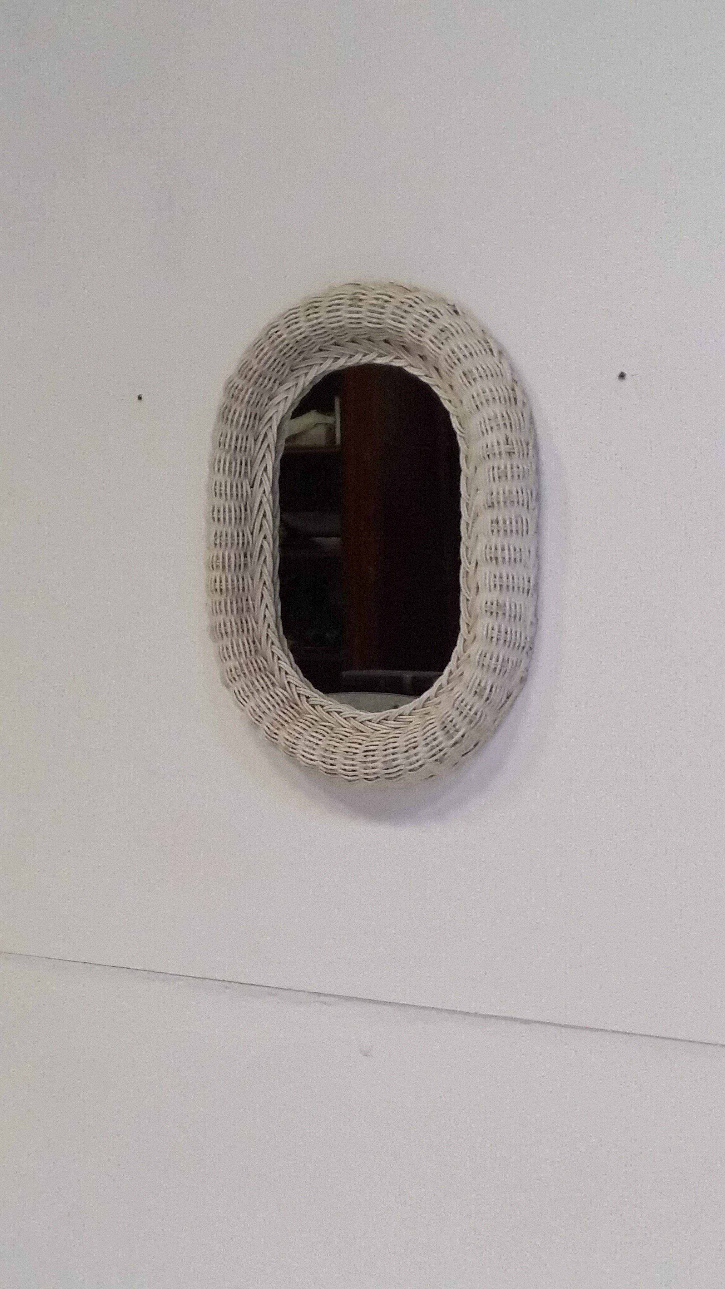 60-year rattan mirror