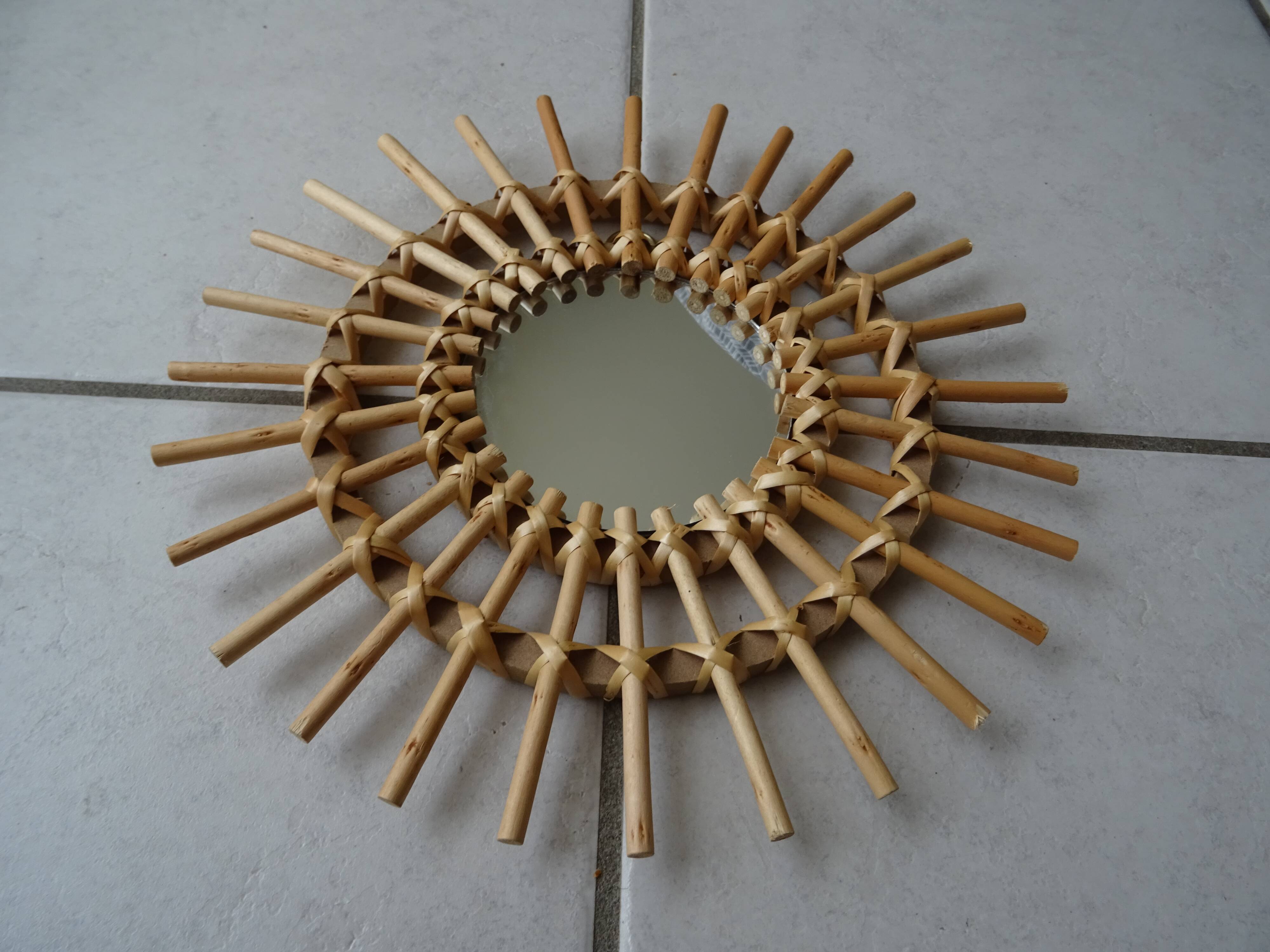 Vintage sun rattan mirror