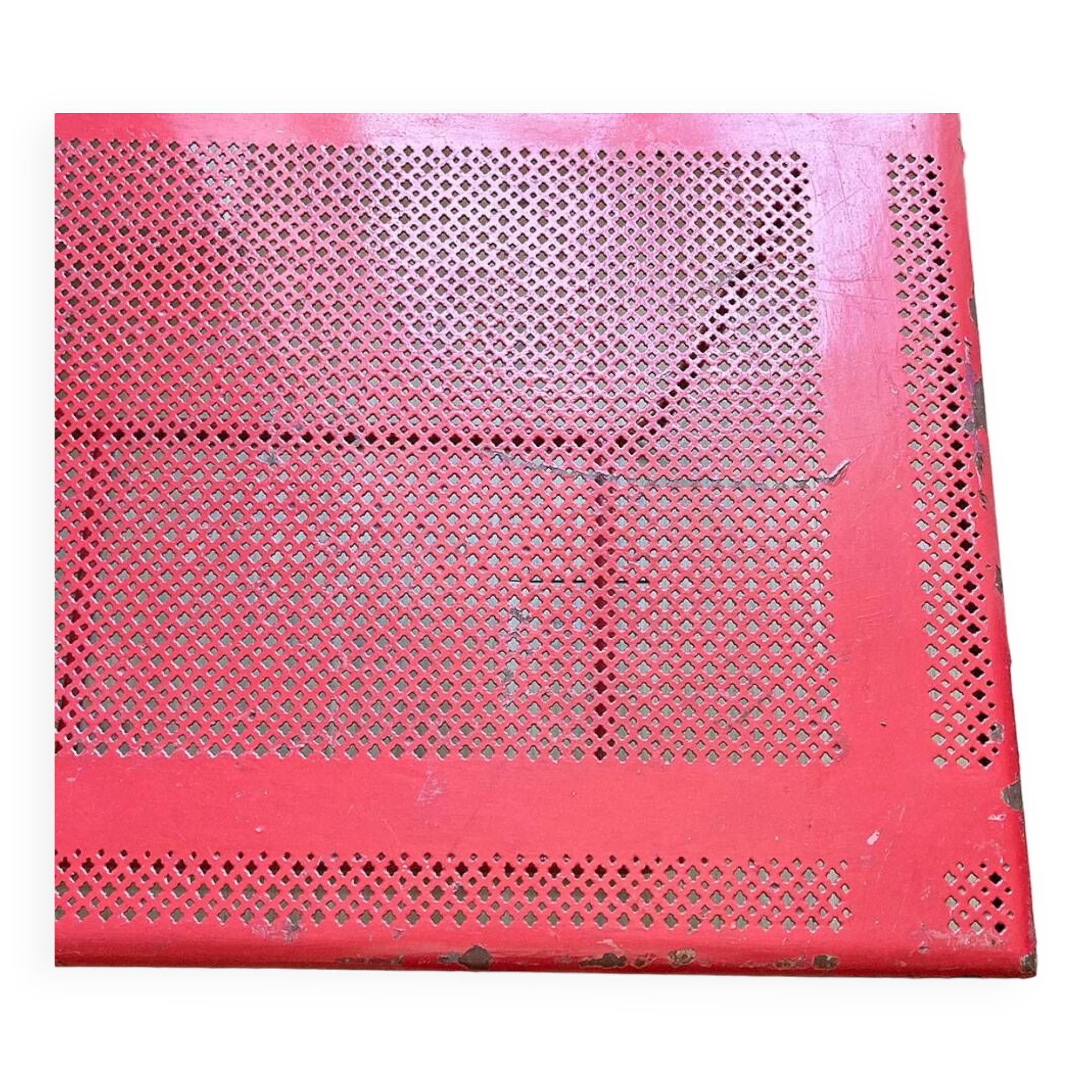 Perforated metal coffee table from the 1950s